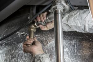 Pression d'eau faible : intervention sur les vannes et raccords de plomberie en Wallonie